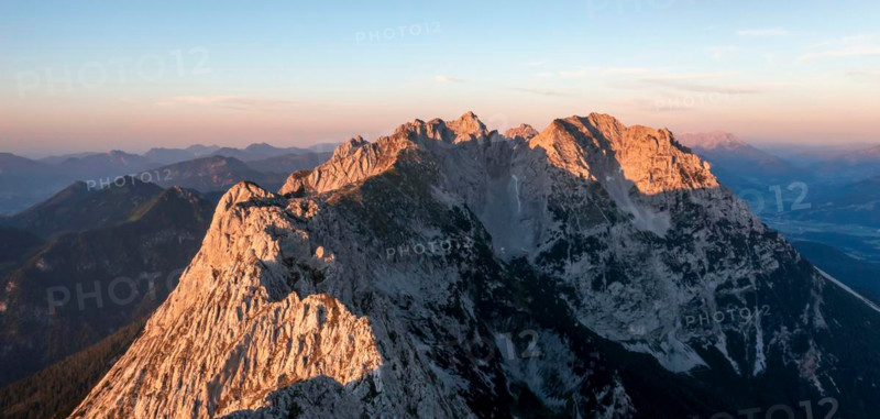 Aerial view, sunset, alpenglow in the mountains, mountain range, Wilder Kaiser, Tyrol, Austria