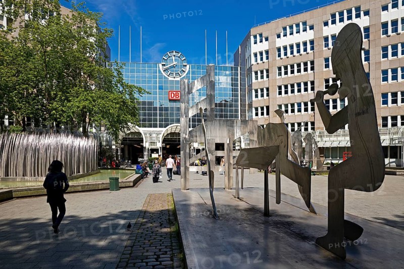 A stainless steel figure group at the main railway station entitled Der Fresser by Horst Antes, Düsseldorf, North Rhine-Westphalia, Germany