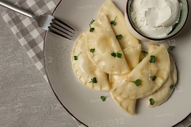 Pierogi, a traditional dish of Polish cuisine, dumplings, top view, close-up, no people