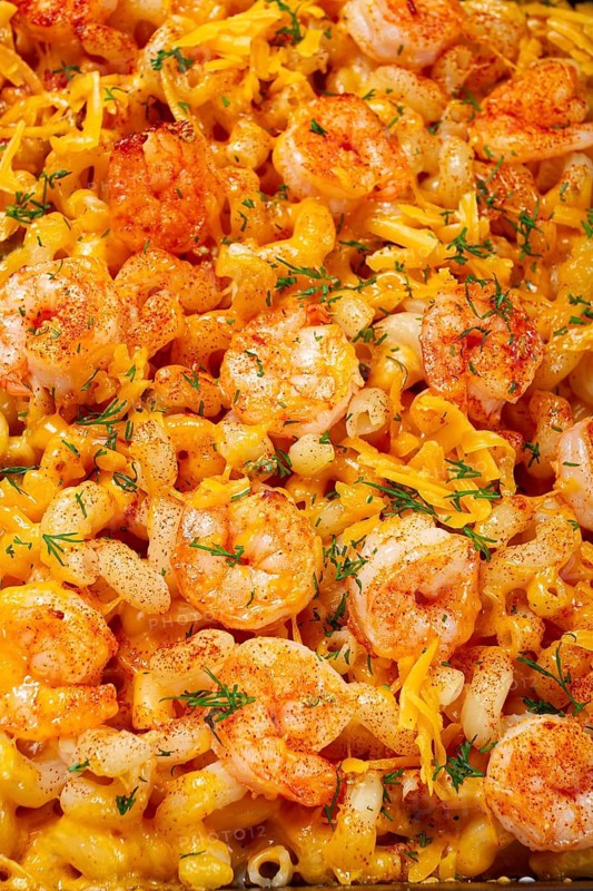 Pasta with shrimp and cheese, with a golden crust, cooked in a baking dish, homemade, no people