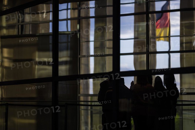 German flag and visitors at the German Bundestag, Berlin, 11.04.2024