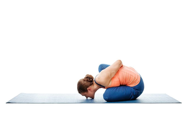 Woman doing Ashtanga Vinyasa Yoga stretching asana Marichyasana B, pose posture dedicated to sage Marichi on white background