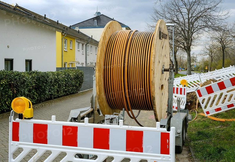 Rheinbach, North Rhine-Westphalia, Germany - Internet broadband expansion, construction site for laying fibre optic cable, cable drum with fibre optic cable, new construction of fibre optic routes on behalf of Telekom, fast Internet, DSL cable connection for households