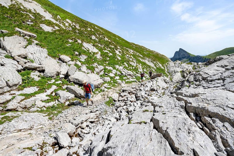 Hiker on a hiking trail, picturesque mountain landscape, Bernese Alps, Bernese Oberland, Switzerland