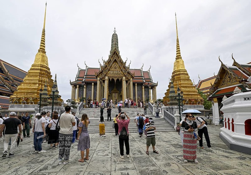 Tourists at Wat Phra Kaew, Temple of the Emerald Buddha, Bangkok, Thailand