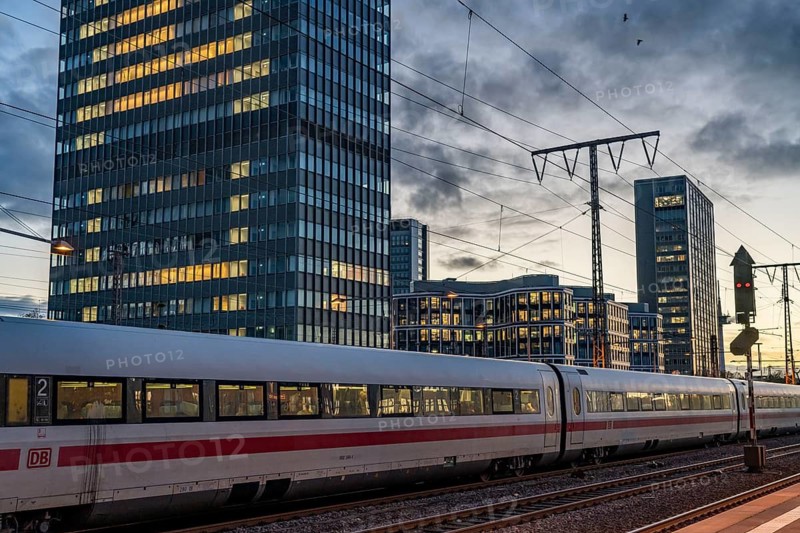 Railway station, ICE train on platform, skyline of Essen city centre, North Rhine-Westphalia, Germany