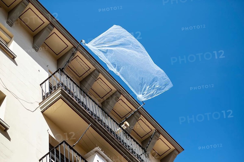 A plastic sheet flutters in the wind on a house in the Barcelonata neighbourhood, Spain