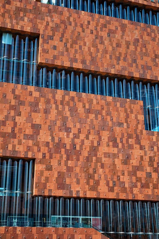 ANTWERP, BELGIUM, MAY 26, 2018: Museum aan de Stroom MAS is a museum located along the river Scheldt designed by Neutelings Riedijk Architects an example of postmodern Art Deco architecture