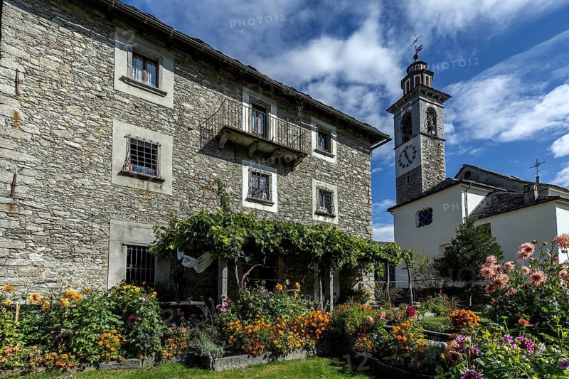 View of the village, typical Ticino stone houses in the mountain village of Rasa, Centovalli, Canton Ticino, Switzerland