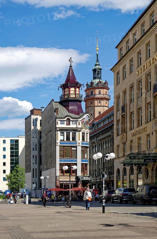 Riquethaus, Riquet coffee house with Art Nouveau mosaics by architect Paul Lange, landmarks are two copper elephant heads, Nikolai Church and Hotel Steigenberger, Leipzig, Saxony, Germany