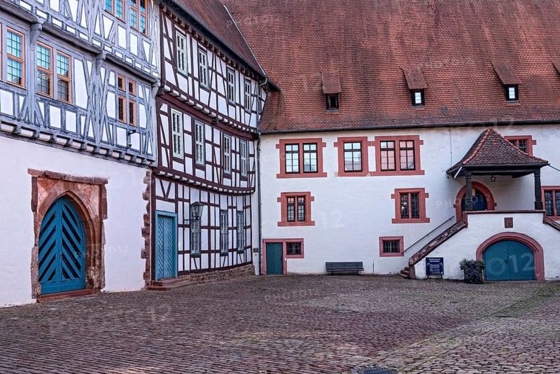 Town castle, winery, inner courtyard with main building, half-timbered palas and central warehouse building with open staircase, today town museum, Middle Ages, historic old town, Michelstadt, Odenwald, Hesse, Germany