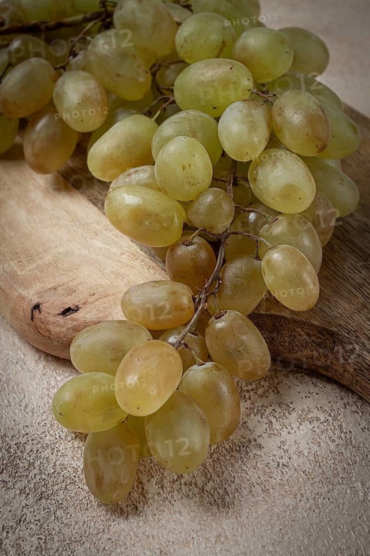 A branch of white grapes, wine grapes, Georgian grape variety Rkatsiteli, top view