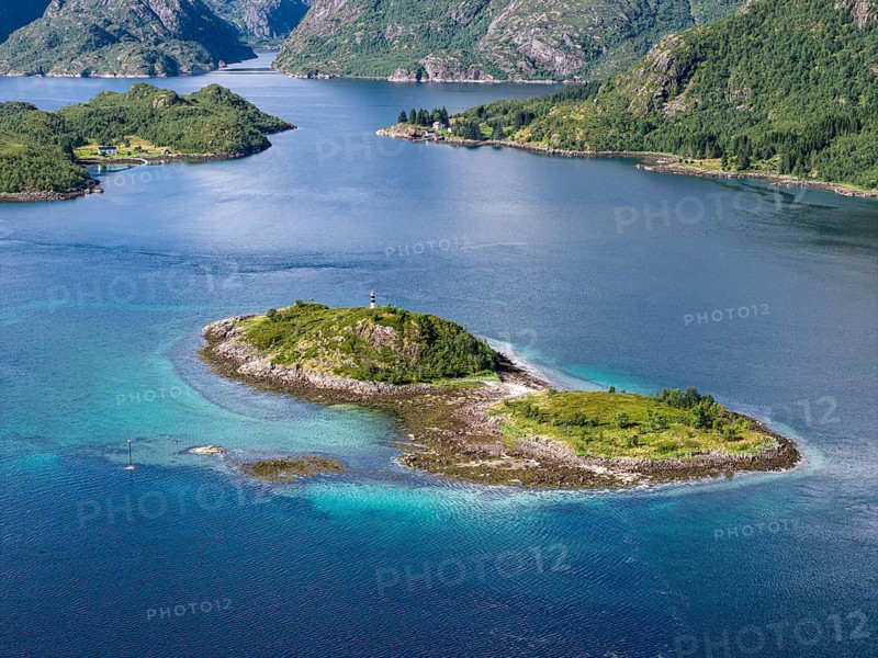 Aerial view over the Raftsund, the waterway between Lofoten and Vesteralen island, island Rognholman in front, entry to famous Trollfjord, Norway