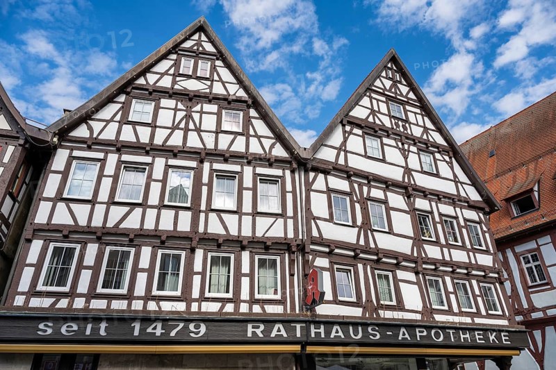 Historic half-timbered houses, town hall pharmacy, Bad Urach, Reutlingen district, Baden-Württemberg, Germany