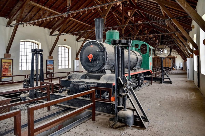 Historic locomotive of the Hejaz Railway in a renovated station building of Hegra, Mada'a in Salih, AlUla region, Medina province, Saudi Arabia, Arabian Peninsula