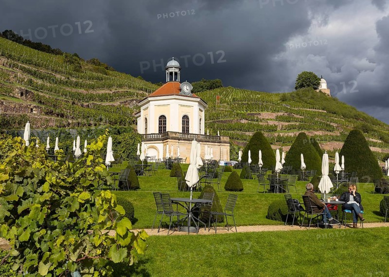 Belvedere in Wackerbarth Castle Park with vineyards and Jacobstein, in sunshine and rain cloud, Radebeul, Saxony, Germany