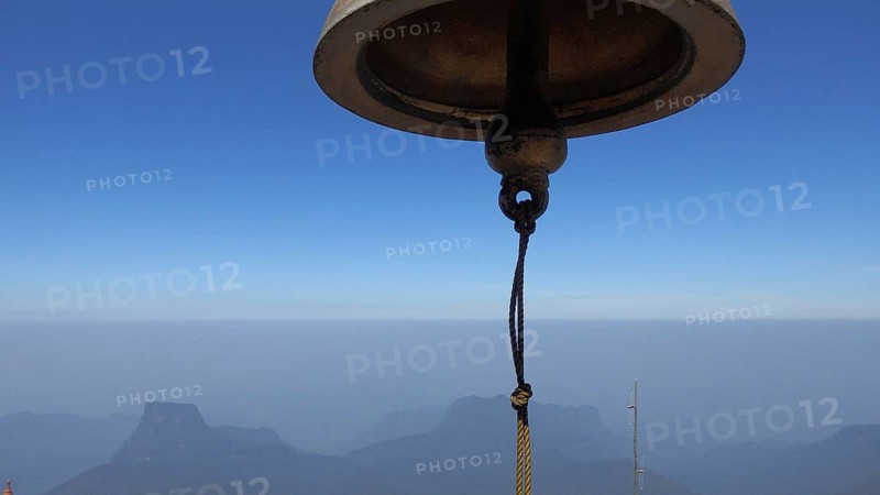 View from Sri Pada, Adam's Peak, Adams Peak, bell with rope floating between sky and mountains, wide view over landscape, Sri Lanka