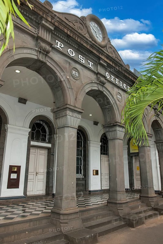 Former main entrance to historic post office above historic lettering Post Office, issuing office of famous stamp Blue Mauritius, today stamp museum, Port Louis, Mauritius