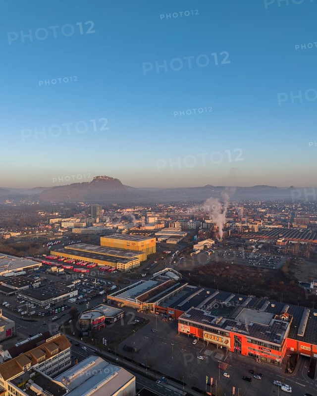 Aerial view of the industrial area of the city of Singen am Hohentwiel, after sunrise, the Hegauberge mountains on the horizon, Konstanz district, Baden-Württemberg, Germany