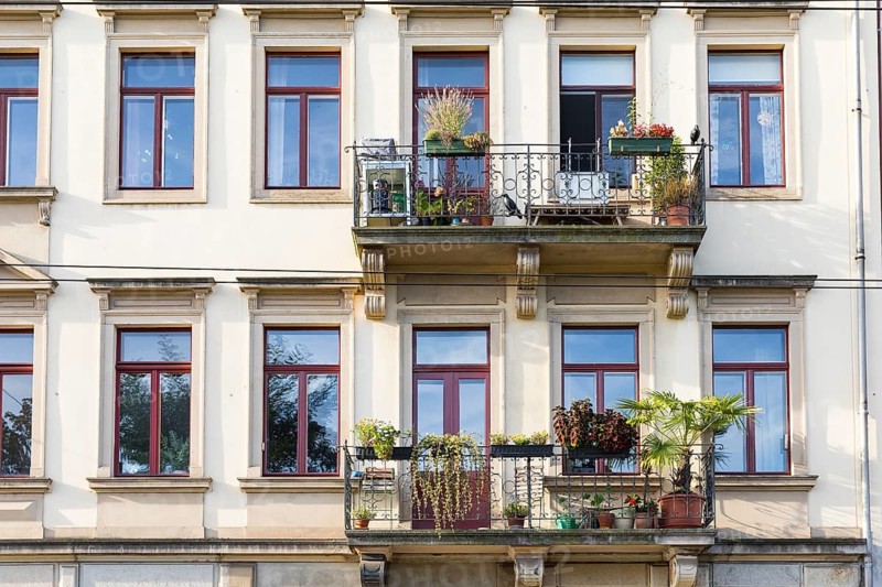 Revitalised balconies of an old building in Görlitzer Straße, Neustadt, Dresden, Saxony, Germany