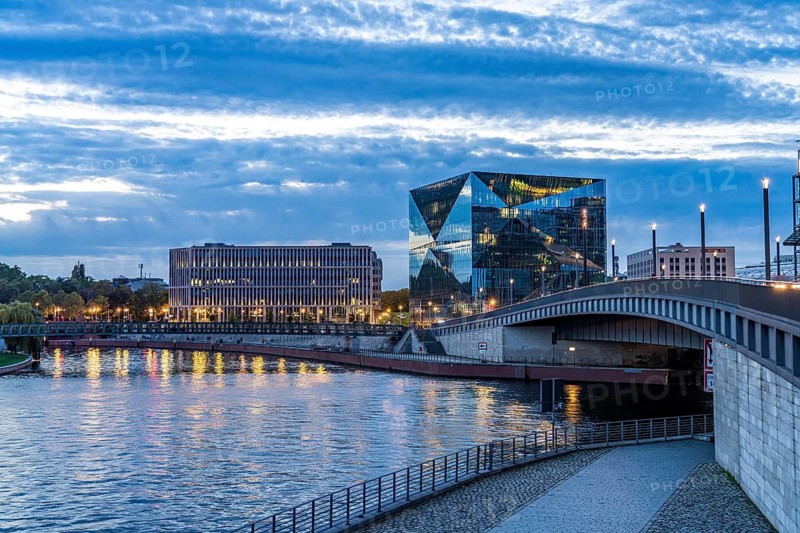 The modern Cube Berlin office building and the River Spree at dusk, Berlin, Germany