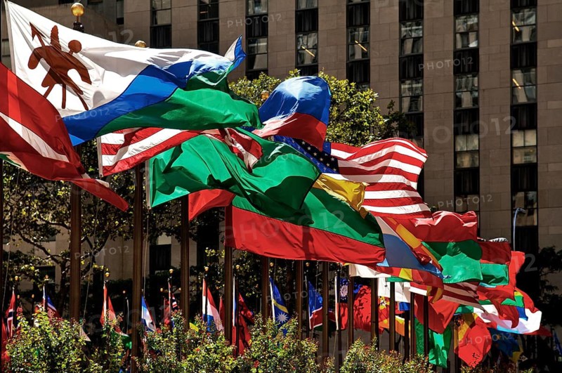 International waving flags at the Rockefeller Centre, New York City, USA