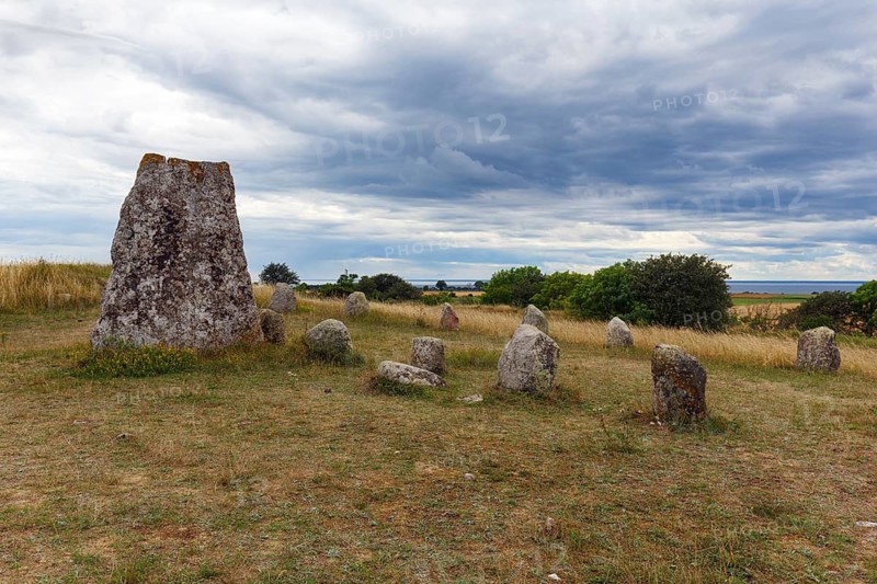 Granite block, burial ground from the Iron Age and Viking Age, stone rows, shipwrecking, barren limestone landscape, Stora Alvaret, UNESCO World Heritage Site, South Öland agricultural landscape, Gettlinge, Südoeland, Öland island, Kalmar län, Sweden