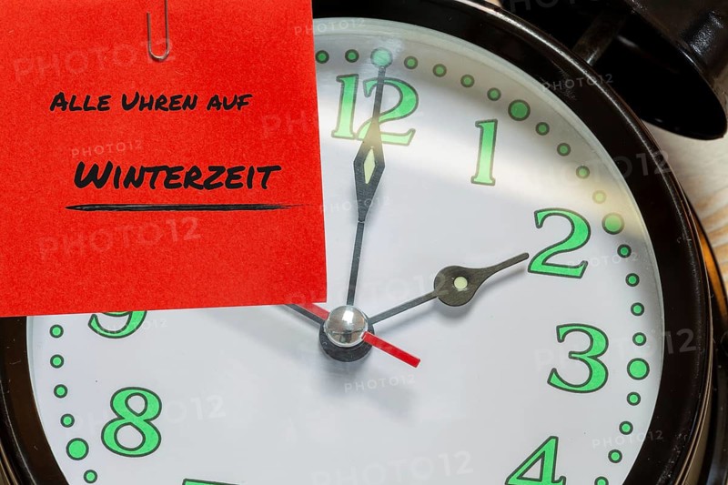 Symbolic image time change, winter time: close-up of an alarm clock set to two o'clock