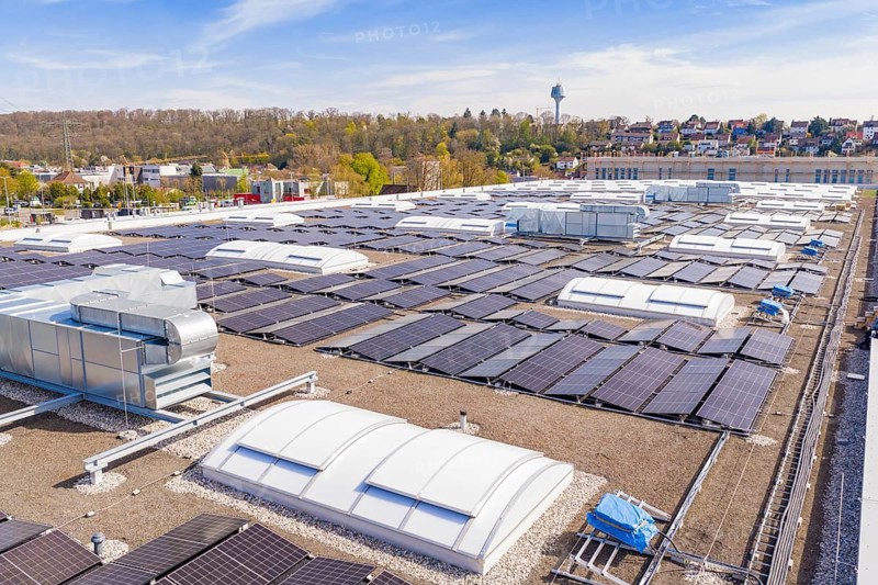 Flat roof with a variety of solar systems and ventilation equipment, PV system at Obi Baumarkt, Mühlacker, Enzkreis, Germany