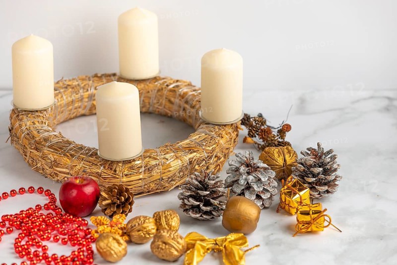 Making an Advent wreath, white candles, Christmas decorations, white background