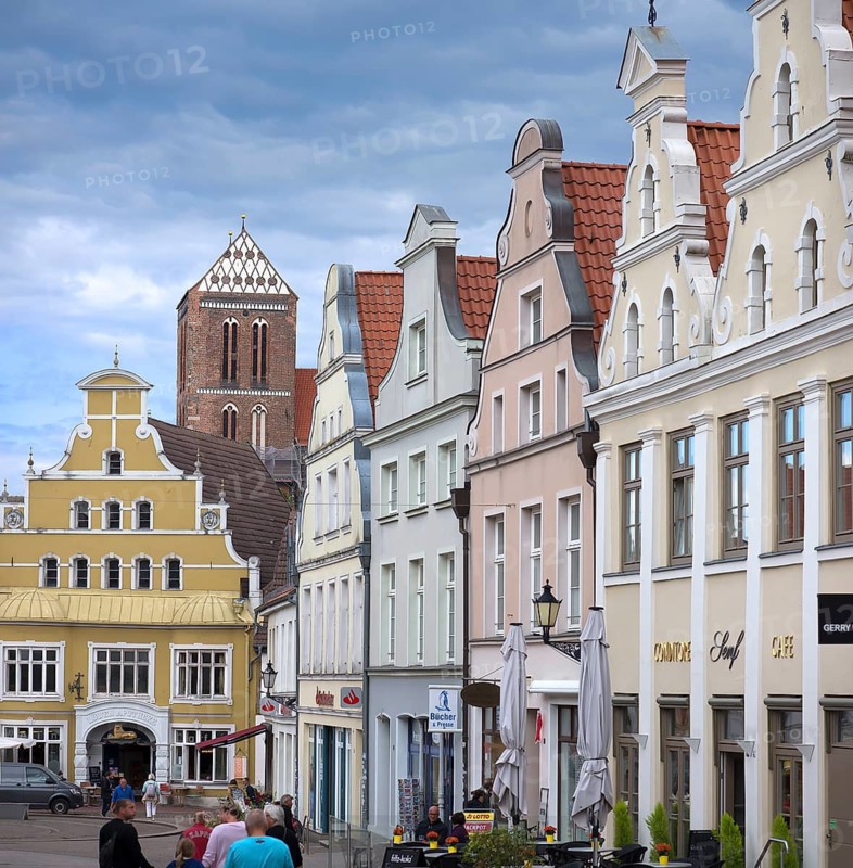 Historic houses, at the back the remaining tower of St Mary's Church, Wismar, Mecklenburg-Vorpommern, Germany
