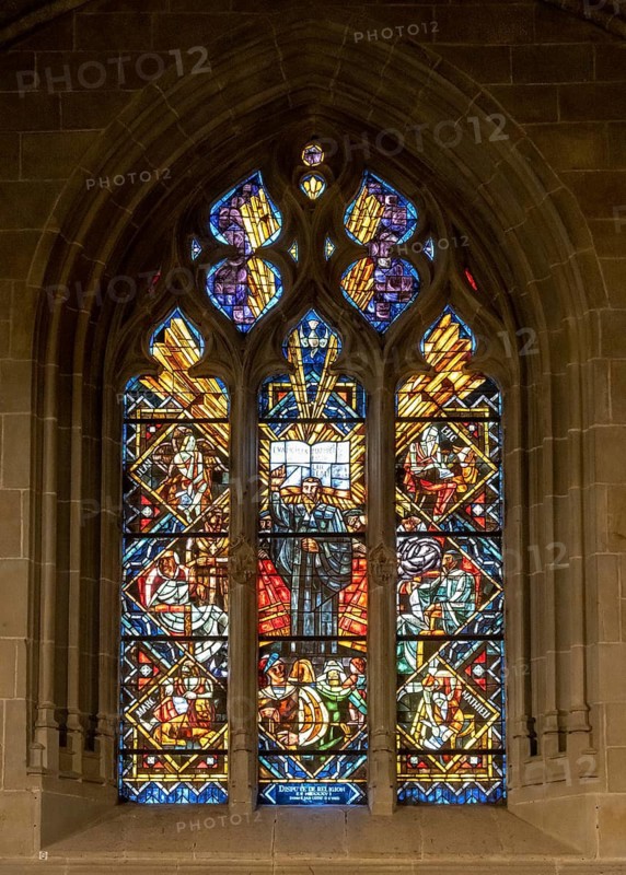 Colourful stained glass windows, Notre-Dame Cathedral, former episcopal church of the diocese of Lausanne, today the main reformed church of the city of Lausanne, canton of Vaud, Switzerland