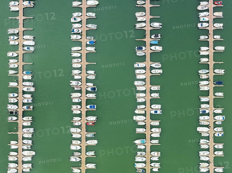 Marina wharves at the river mouth of the Piedras River. Aerial view. Drone shot. Huelva province, Andalusia, Spain