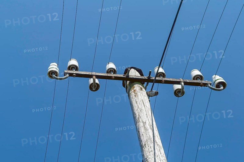 Wooden electricity pylon, electricity pylon with ceramic insulators, Münsterland, North Rhine-Westphalia, Germany