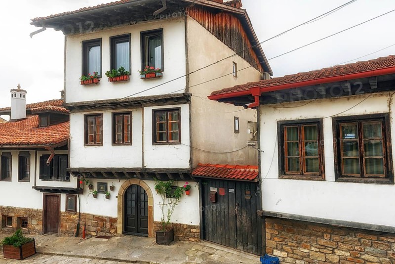 Veliko Tarnovo, Bulgaria. September 26th 2023 Traditional Bulgarian wooden houses, typical architecture of Veliko Tarnovo, located on the Yantra River in north central Bulgaria