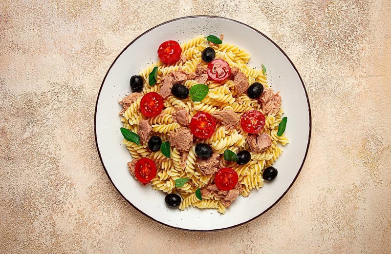Tuna salad, fusilli pasta, olives and cherry, olive oil, homemade