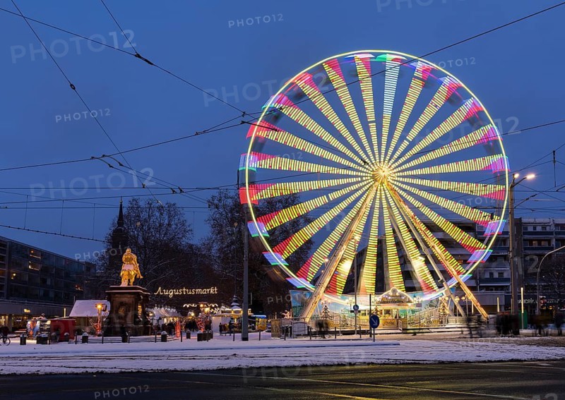 Illuminated Ferris wheel at the Golden Horseman during the Blue Hour, Augustusmarkt on the main street, Dresden, Saxony, Germany
