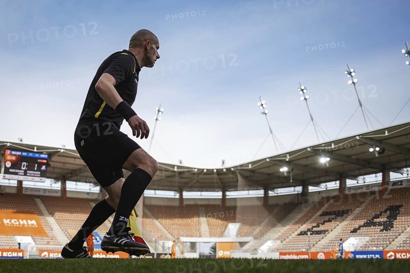LUBIN, POLAND - APRIL 11, 2021: Football match Polish PKO Ekstraklasa between KGHM Zaglebie Lubin - Podbeskidzie Bielsko-Biala 2:1. In action Tomasz Niemirowski - sideline referee