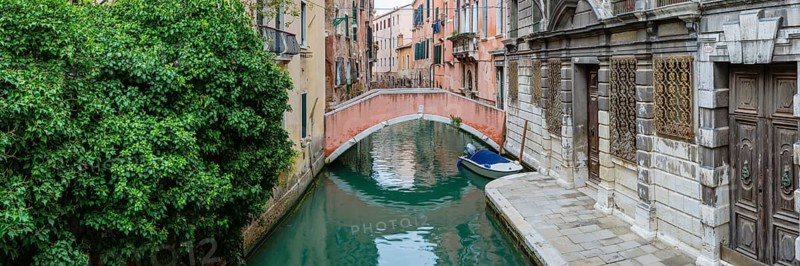 Arched bridge over the old town canal, Venice, Veneto, Italy