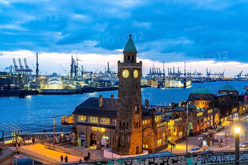Port of Hamburg, view over the St. Pauli Landungsbrücken, Pegelturm, to the Blohm + Voss shipyard, in the evening, cranes of the container terminals, Hamburg Germany