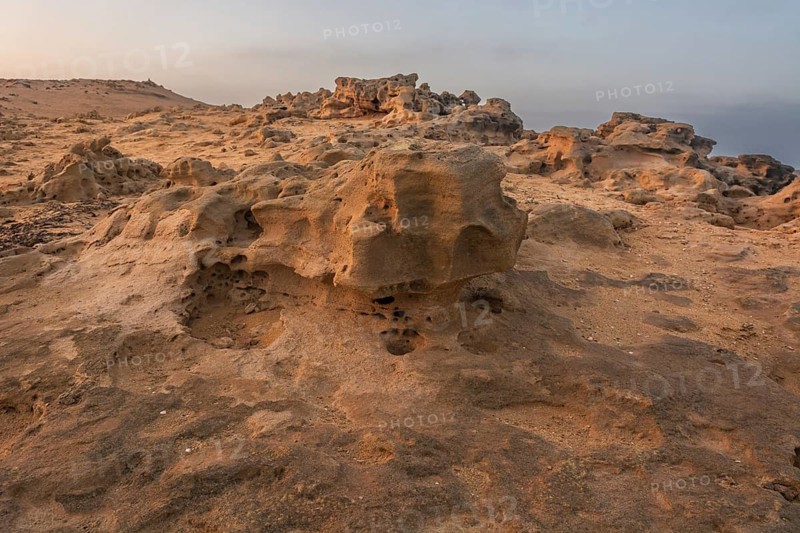 A rocky area with a hole in the ground. Rabat, Morocco