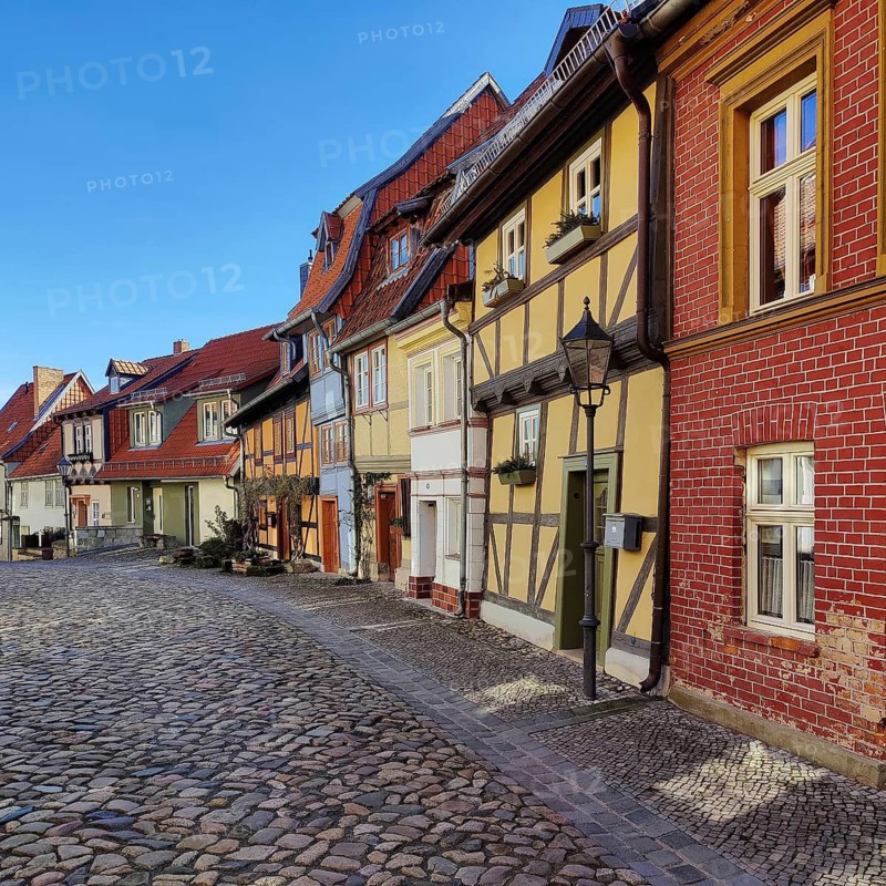 Half-timbered houses with cobblestones in Wassertorstraße, Old Town of the World Heritage City of Quedlinburg, Saxony-Anhalt, Germany