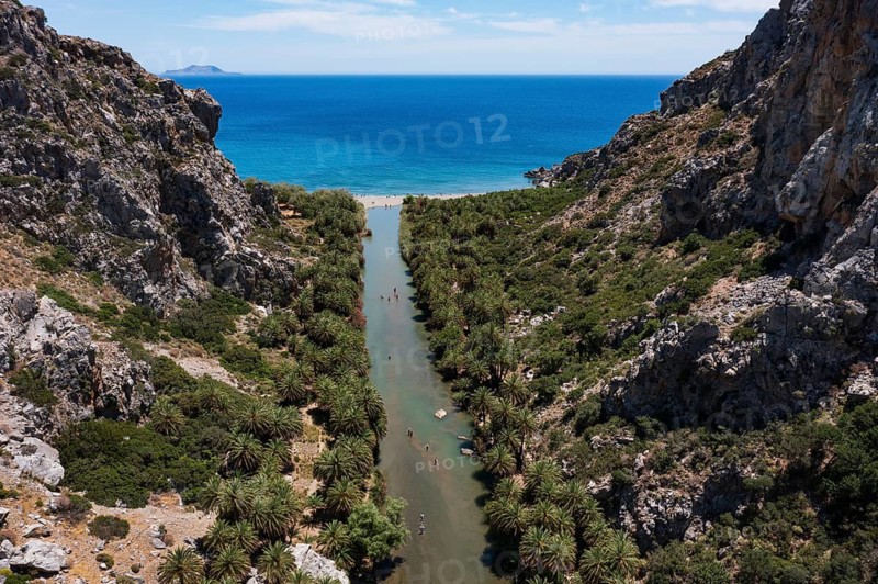 Drone shot, Preveli Beach, Kourtaliatiko Gorge with palm grove, south coast, Crete, Greece