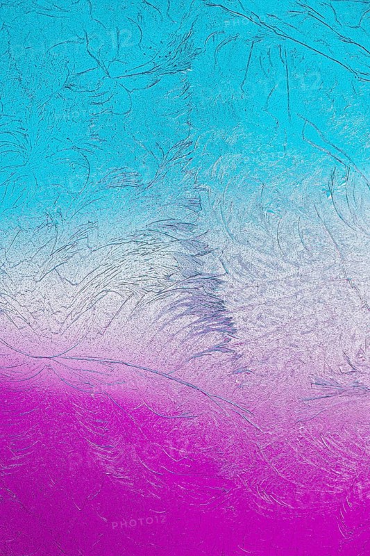 A vivid display of microcrystals under the microscope showcases intricate patterns in shades of blue and pink, highlighting the fractal like structures and gradients