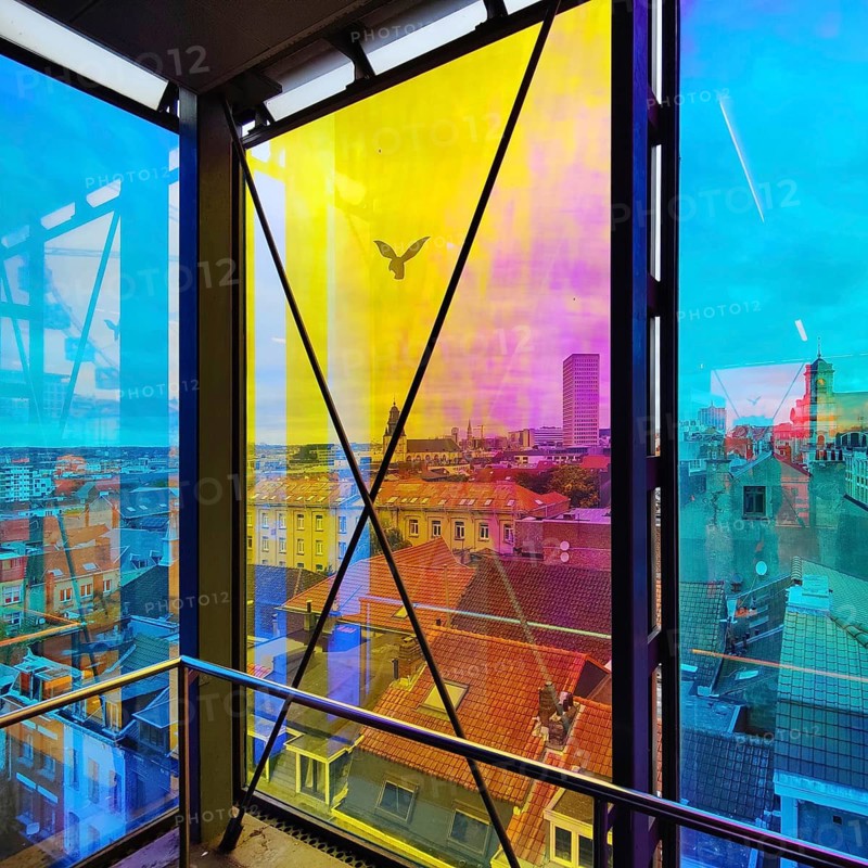 Marollescenece, art installation The Cube, coating of the windows with translucent dichroic films, Poelaert, Brussels, Belgium