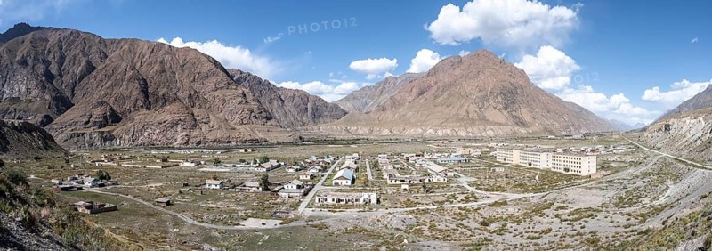 Panorama, Abandoned ruined buildings in mountain landscape, Ghost town, Engilchek, Tian Shan, Kyrgyzstan