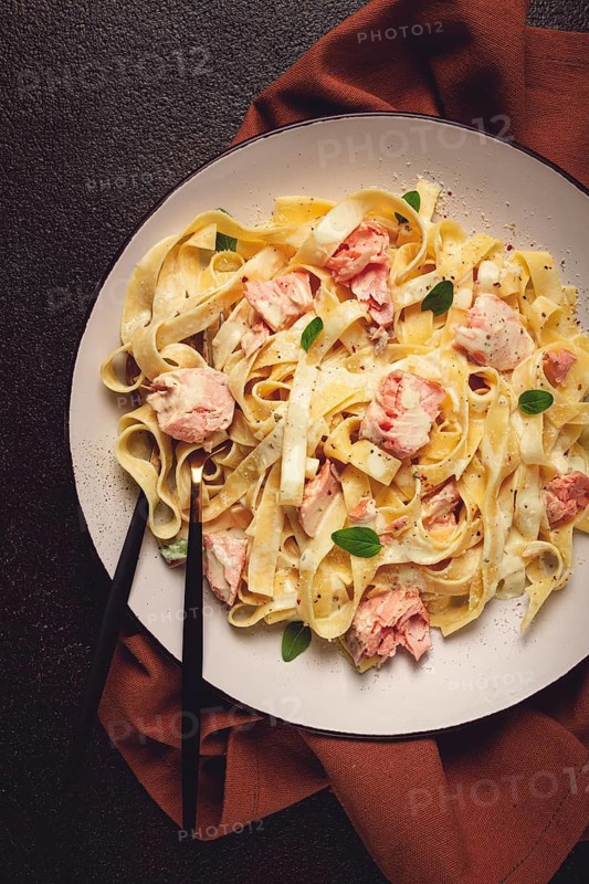 Tagliatelle pasta, in cream sauce with salmon, homemade, no people