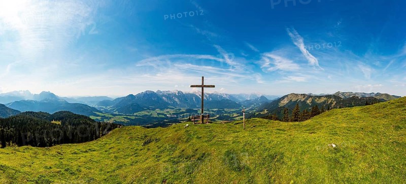Summit cross on the Taborberg with a view of the Lammertal valley with Gosaukamm and Tennengebirge mountains, Osterhorn group, Salzkammergut, Salzburg province, Austria