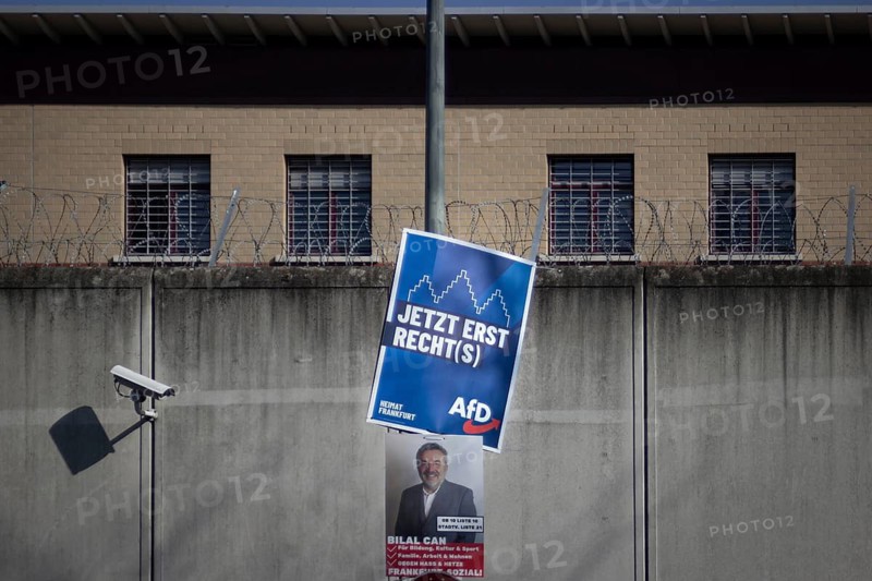 Election posters for the AfD (Alternative for Germany) and Frankfurt Sozial! hang outside a prison in Frankfurt am Main. The Hessian state government has set 15 March 2026 as the election date for local elections in Hesse. On this day, the elections for the city council and the 16 local councils will take place in Frankfurt am Main, Preungesheim, Frankfurt am Main, Hesse, Germany