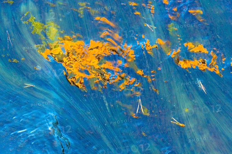Light reflection in a stream, abstract, Norrbotten, Lapland, Sweden, August 2022